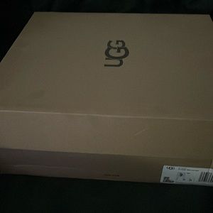 Ugg mini cow print boots